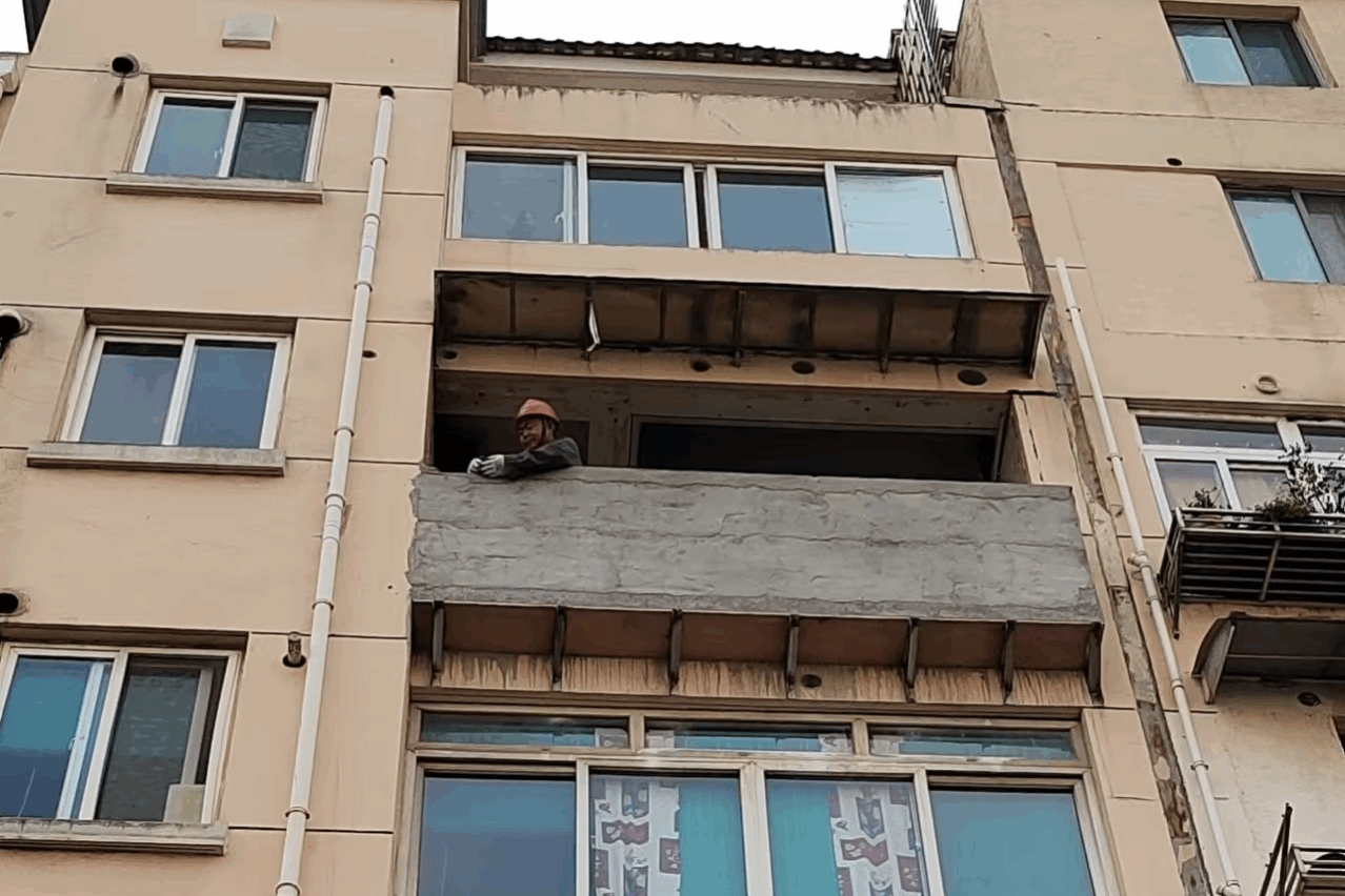 1752471278-广州市江海街道红卫新村征收大量历史违建,如何平衡“违建清零”与民生安置需求?